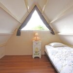 Sandepark 88. Slaapkamer 2 boven. 1 éénpersoonsbed, en ruimte voor een extra bed, of een kinderbed.